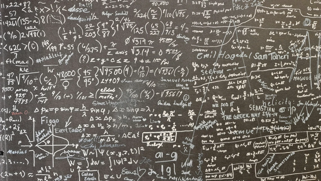 a blackboard with a lot of writing on it